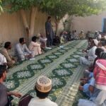 Community stakeholders gather during the engagement.